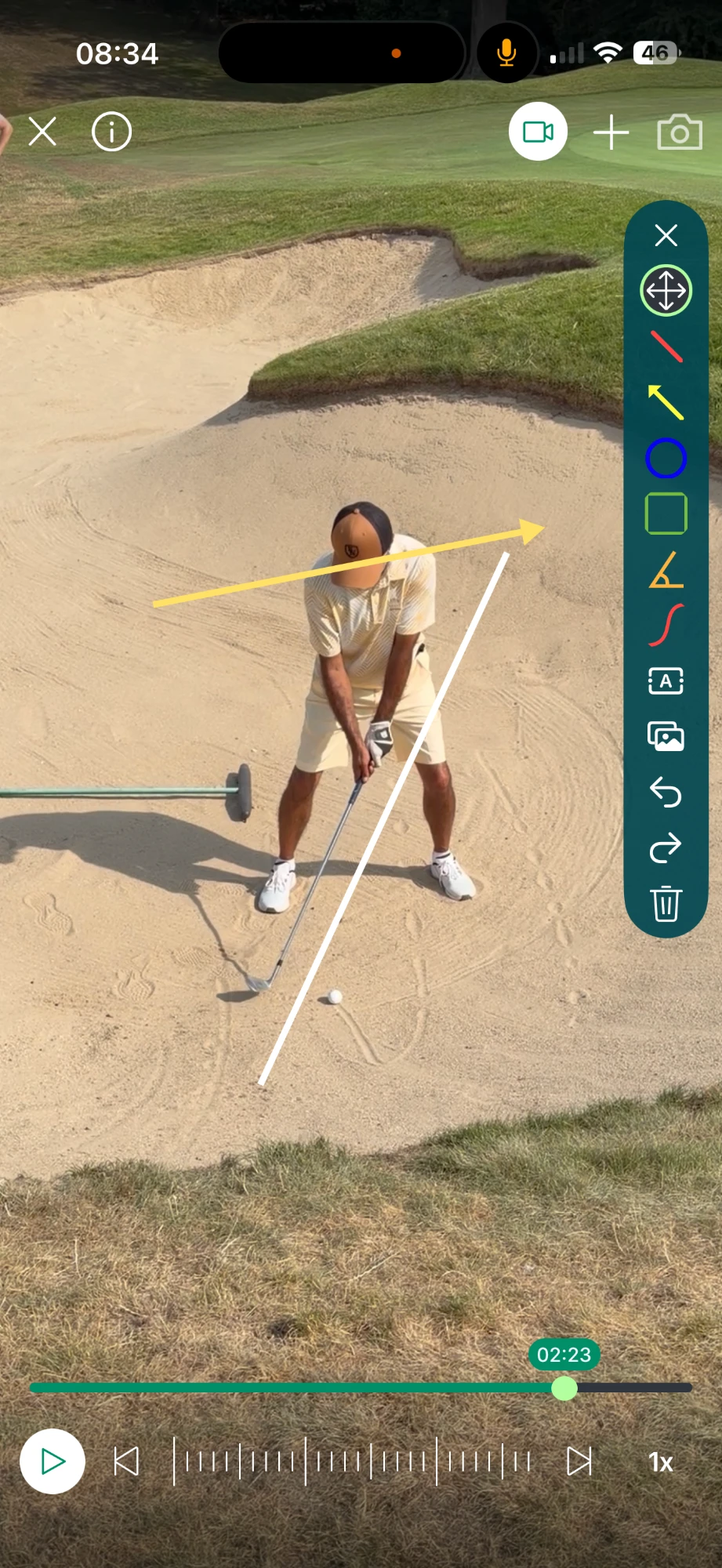 Analysis example: a bunker shot annotated with a white line and yellow arrow